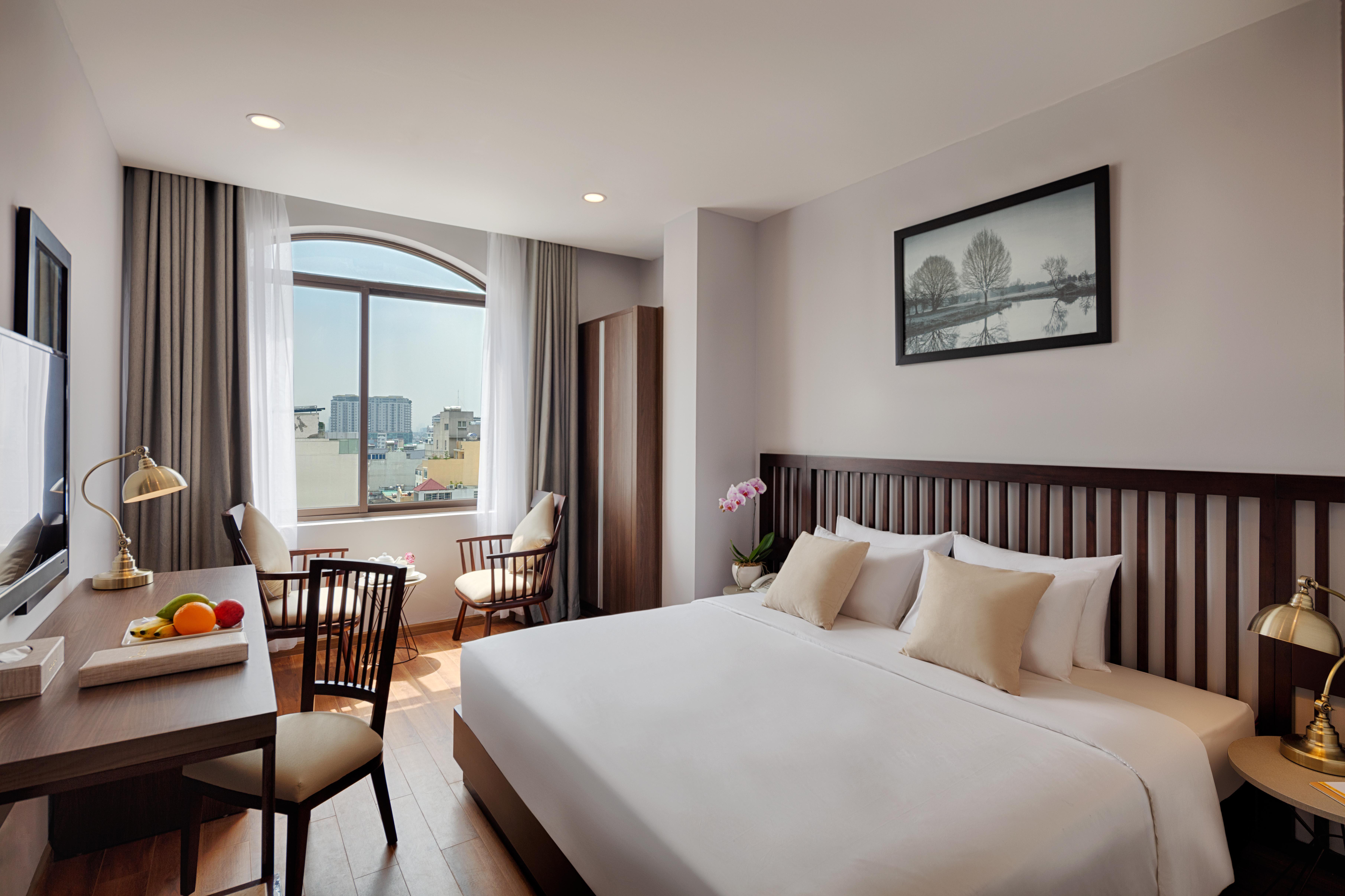 Happy Life Grand Hotel & Rooftop Skybar Хошимин Екстериор снимка