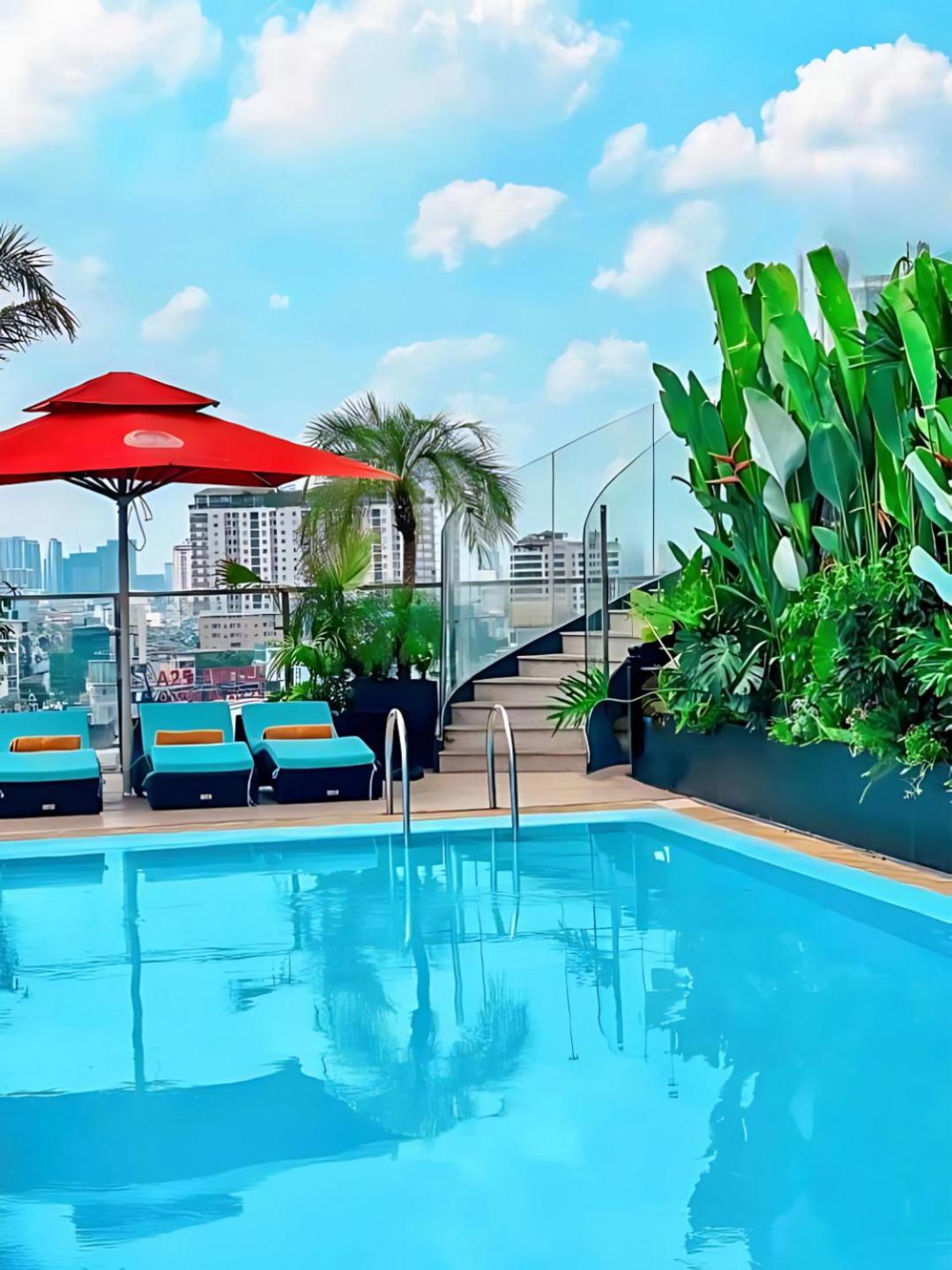 Happy Life Grand Hotel & Rooftop Skybar Хошимин Екстериор снимка